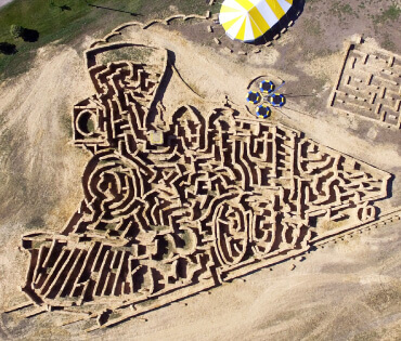 Train pulling ore car maze